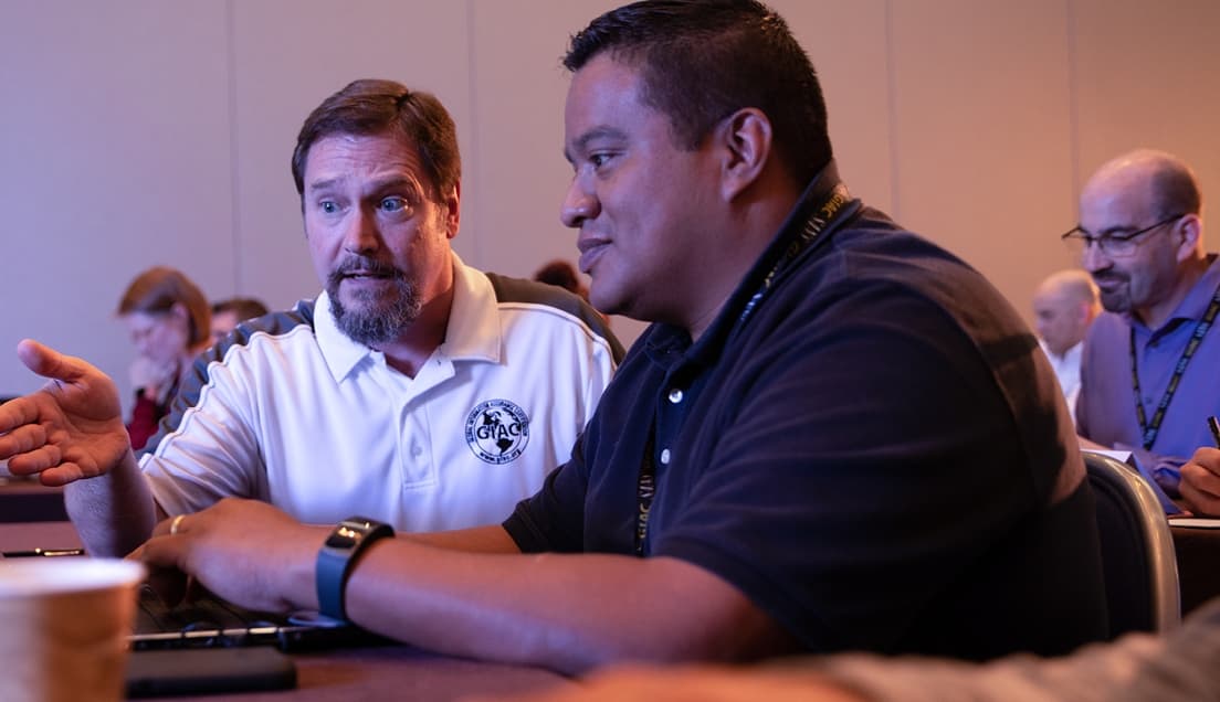 Instructor Helping Student