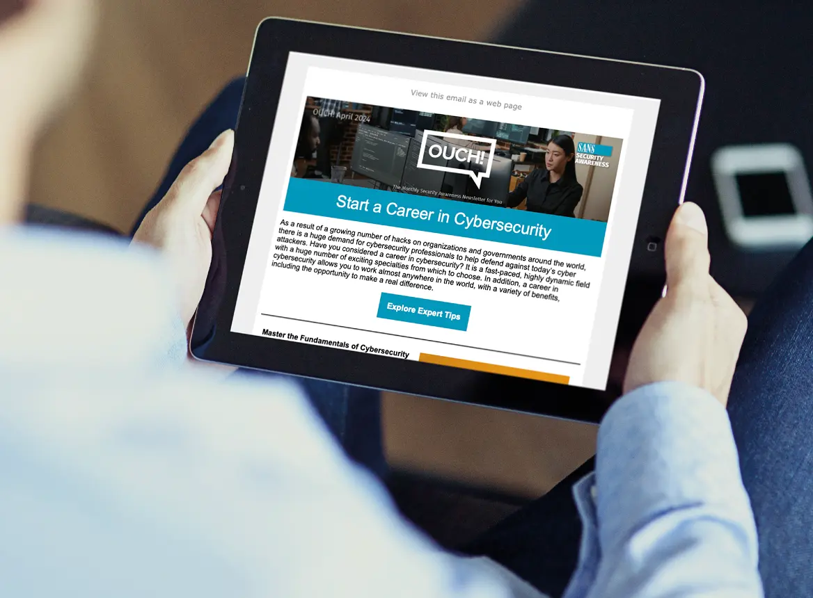 Person reading content from a laptop.