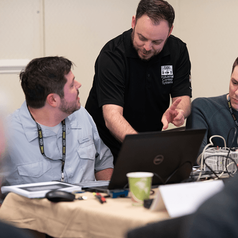 Instructor helping student