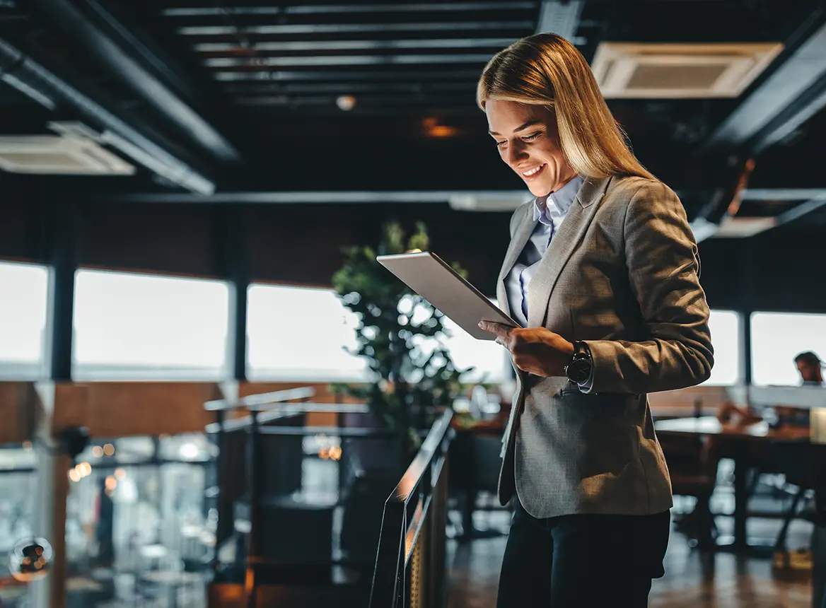 Person reading content from a tablet device.