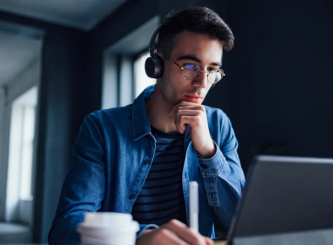 Man With Glasses Wearing Headphones