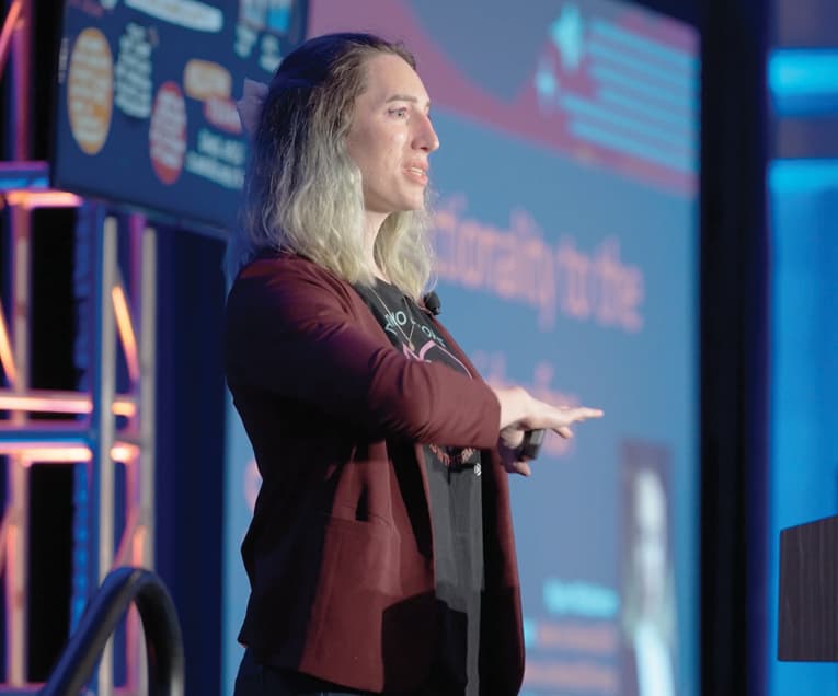 Person Giving a Lecture on a Stage