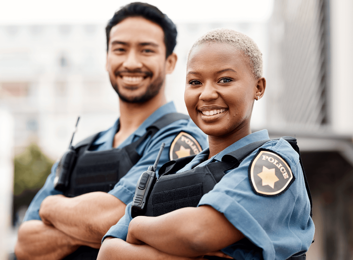 Two Police Officers Smiling
