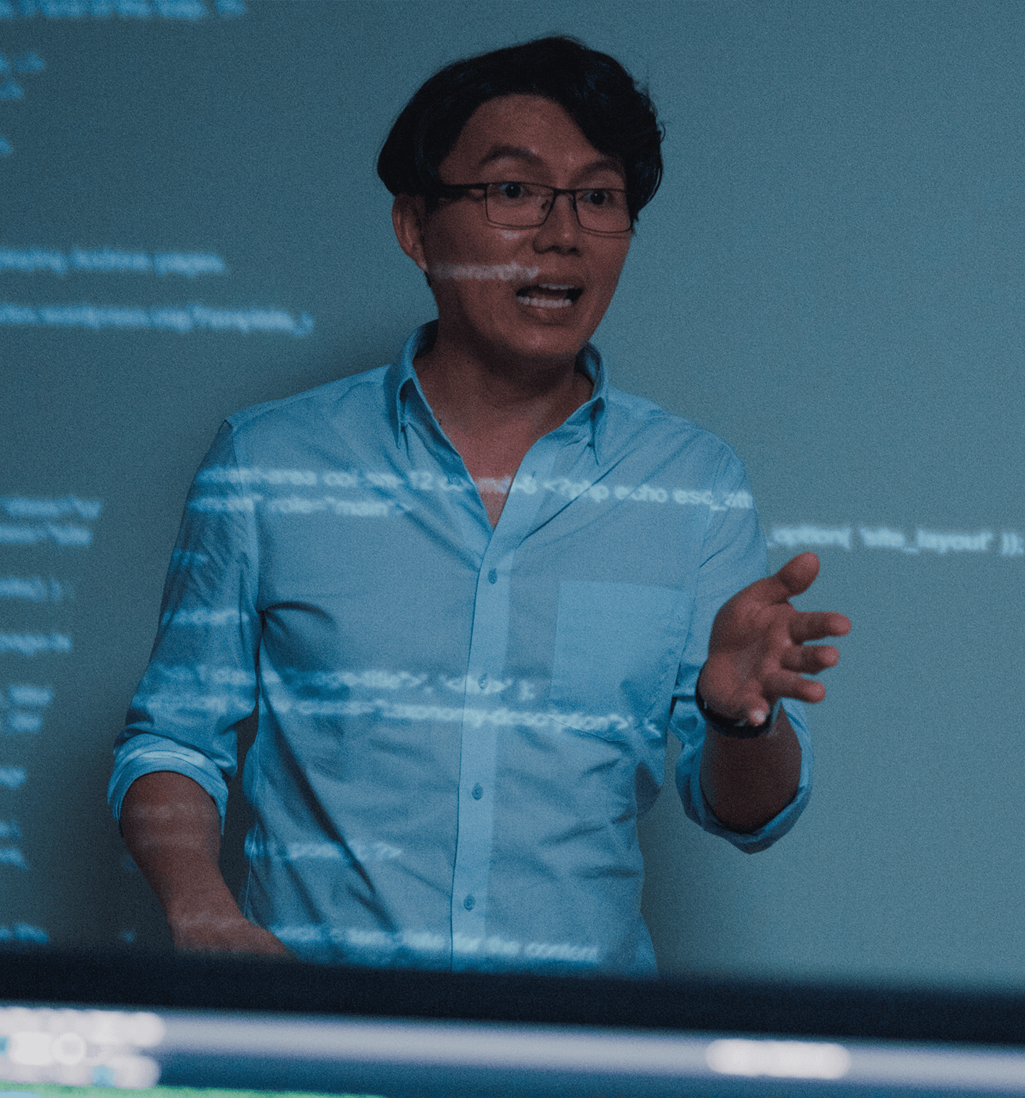 Teacher Excitedly Explaining Concept in Front of Smartboard