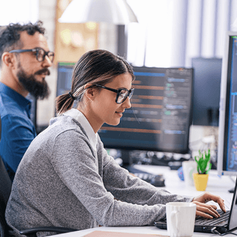 Two Office Workers at Their Desk